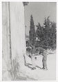 A soldier from 1st Battalion Middlesex Regiment in Cyprus searches a Cypriot, Cyprus, 1957 (c)