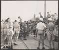 Troops searching a Jewish immigrant boat and the refugees disembarking, Haifa, 1948 (c)