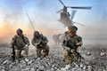British soldiers disembarking from a Chinook helicopter, Operation ZAMARY KARGHA (LION FALCON), Afghanistan, 2010