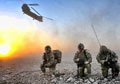 British soldiers disembarking from a Chinook helicopter, Operation ZAMARY KARGHA (LION FALCON), Afghanistan, 2010