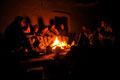 Soldiers of 2nd Battalion, Parachute Regiment, seated around a fire in Afghanistan, 2011
