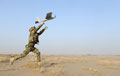 A member of 32nd Regiment Royal Artillery launches a Desert Hawk UAV, Operation DAAS ZEER ZAMIN, 2012