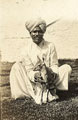 Havildar with baby antelope, hunting expedition, India, 1918 (c)