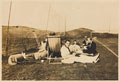 Wounded personnel enjoying a picnic on a tennis court at Watermouth Castle, Devon, 1918