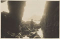 A wounded serviceman exploring rock pools at Ilfracombe, Devon, 1918