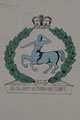 Mural of Royal Army Veterinary Corps badge on a blast wall, Iraq, 2009