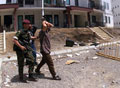 Rounding up suspects in Pristina, 1999