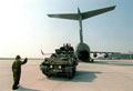 British Army vehicles disembark from transport aircraft, Macedonia, 1999
