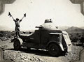 Vickers Crossley armoured car with a soldier signalling with flags, 1925 (c)