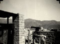 'Machine gun ready for action on No 2 Tower Permanent picquet on opposite hill', Dosalli, North West Frontier, India, 1937