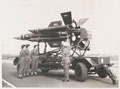 Woman's Royal Army Corps personnel with a demonstration model of a Thunderbird missile on trailer, no date