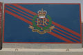 Concrete blast wall section decorated with a mural of Royal Military Police insignia, Basra, Iraq, 2009