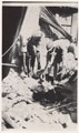 An Indian Army rescue and salvage squad discover a body after the earthquake.in Quetta in 1935