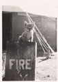 A cat sitting on top of a barrel, Quetta, 1935 (c)