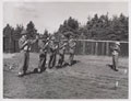 Training with the Sterling machine gun, 1960 (c)