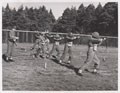 Training with the Sterling machine gun, 1960 (c)