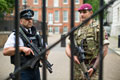A soldier from 2nd Battalion The Parachute Regiment, with a member of the Metropolitan Police, Operation TEMPERER, London, 29 May 2017