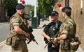 Soldiers from 1st Battalion, The Royal Regiment of Fusiliers, provide security in central London, alongside an armed member of the Ministry of Defence Police, as part of Operation TEMPERER, 28 May 2017