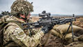 A member of the Royal Welsh infantry regiment with Minimi machine gun, Exercise BLACK EAGLE, Poland, 2014.