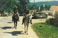 King's Royal Hussars on mounted patrol with pack horses, alongside their Challenger 1 main battle tanks, Mrkonjic Grad area, Bosnia, 1997