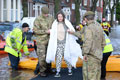 Soldiers from 1st Battalion, The Duke of Lancaster's Regiment help evacuate residents during floods in Carlisle, Cumbria, 2015