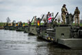 M3 Amphibious Rigs form a pontoon bridge across the River Weser, Germany, 2016