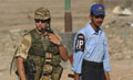 Joint British Army and Iraqi Police patrol, Basra, Iraq, 2004