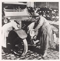 Queen Mary's Army Auxiliary Corps personnel working on a car, Aldershot, 1918 (c)