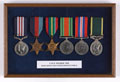 Framed Military Medal group awarded to Sergeant Charles Douglas Neville Walker, Hong Kong Volunteer Defence Force