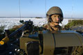 A Spartan armoured personnel carrier crewman of The Light Dragoons, Robertson Barracks, Norfolk, March 2004