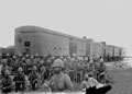 Troops in front of an armoured train, 1900 (c)