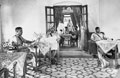 Indian officers of the 5th Mahratta Light Infantry relax in the mess, 1940 (c)