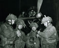 Pathfinders synchronising their watches before flying into battle in Normandy, 5 June 1944