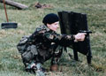 Female officer cadet, Women's Royal Army Corps, training with a Browning pistol at the Royal Military Academy Sandhurst, 1984 (c)
