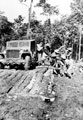 An ambulance jeep being lifted out of the mud, Burma, 1944 (c)