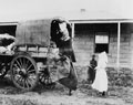 Removing a Boer family from a farm, 1900