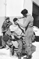 Private D Hunt, 3rd Battalion, The Parachute Regiment, has a haircut, Ismailia, 25 January 1952