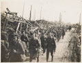 Soldiers of the Duke of Cambridge's Own (Middlesex Regiment) moving up through Achiet-le-Petit, March 1918