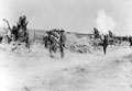 A British howitzer battery in action, 1916 (c)