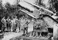 British officers standing by a large calibre howitzer, 1916 (c)