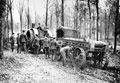 A tractor engine bringing shells up for the 15-inch howitzers in Englebelmer Wood, September 1916