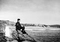 A member of the 3rd County of London Yeomanry (Sharpshooters) enjoys the relative tranquillity of the Pembrokeshire coast, Wales, 1941