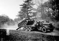 A15 Crusader tank of 3rd County of London Yeomanry (Sharpshooters) driving on to a transporter, Parham, West Sussex, 1941