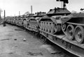 'Witley Station: The move to Westbury', Cruiser tanks of 3rd County of London Yeomanry (Sharpshooters) on flatbed railway trucks, 1941