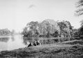 Three soldiers from 3rd County of London Yeomanry (Sharpshooters) relax by a lake in Thoresby Park, Nottinghamshire, 1940