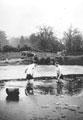 'Xmas Day 1940. Chas Rich, Stanley Reddish break the ice', Chiddingfold, Surrey, 1940