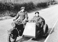Percy Barton and Peter Smethurst, 3rd County of London Yeomanry (Sharpshooters) on a motorcycle, 1940 (c)