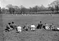 British soldiers watch a cricket match at Chiddingfold Green, Surrey, 1941