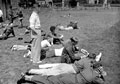 British soldiers watch a cricket match at Chiddingfold Green, Surrey, 1941