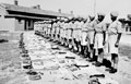 Recruits of 17th Dogra Regiment await kit inspection, Jullunder, India, 1944 (c)